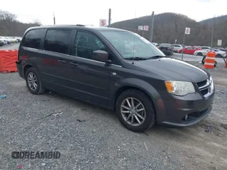 2014 Dodge Grand Caravan SXT with VIN 2C4RDGCG6ER376714, listed as a IAAI auction lot 41828025 with 172,285 mi miles and . Bid and sale history available at DreamBid. Image 1.