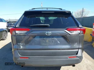 2019 Toyota RAV4 LE with VIN JTMG1RFV3KD025974, listed as a IAAI auction lot 41879264 with 131,933 mi miles and . Bid and sale history available at DreamBid. Image 16.