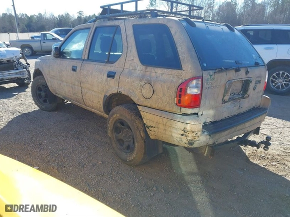 2001 Isuzu Rodeo S with VIN 4S2DM58W214322178, listed as a IAAI auction lot 41398609 with 180,017 mi miles. Bid and sale history available at carsss.com. Image 3.