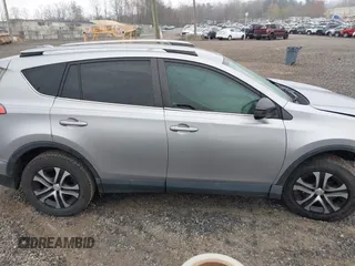 2017 Toyota RAV4 LE with VIN 2T3ZFREV8HW318096, listed as a IAAI auction lot 41928696 with 133,221 mi miles and . Bid and sale history available at carsss.com. Image 14.