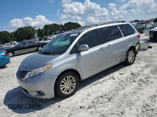2015 Toyota Sienna XLE with VIN 5TDYK3DC6FS636382, listed as a Copart auction lot 61267095 with 83,779 mi miles and Salvage title. Bid and sale history available at DreamBid. Image 1.