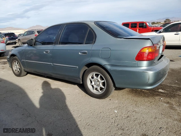 2000 Honda Civic VP with VIN 2HGEJ6617YH545899, listed as a Copart auction lot 86648614 with 212,551 mi miles and Salvage Title. Bid and sale history available at carsss.com. Image 2.