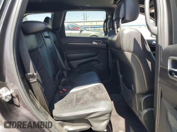 2018 Jeep Grand Cherokee Altitude with VIN 1C4RJFAG5JC320742, listed as a Copart auction lot 56988195 with 140,320 mi miles and Salvage title. Bid and sale history available at DreamBid. Image 11.
