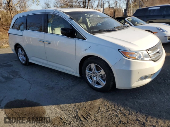 2012 Honda Odyssey Touring with VIN 5FNRL5H96CB144690, listed as a Copart auction lot 81511844 with 44,030 mi miles and Salvage Title. Bid and sale history available at carsss.com. Image 4.