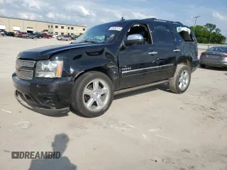 2013 Chevrolet Tahoe LTZ with VIN 1GNSKCE0XDR379028, listed as a Copart auction lot 55066515 with 160,453 mi miles and Salvage title. Bid and sale history available at DreamBid. Image 1.