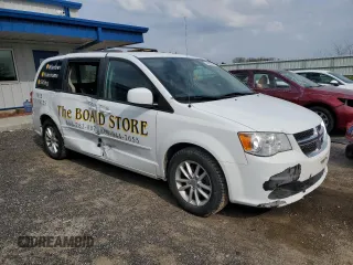 2014 Dodge Grand Caravan SXT with VIN 2C4RDGCG4ER371415, listed as a Copart auction lot 54400645 with 150,055 mi miles and Non Repairable. Bid and sale history available at DreamBid. Image 4.
