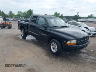 2000 Dodge Dakota Sport with VIN 1B7GL2AX5YS775200, listed as a IAAI auction lot 42113896 with 224,337 mi miles. Bid and sale history available at carsss.com. Image 1.