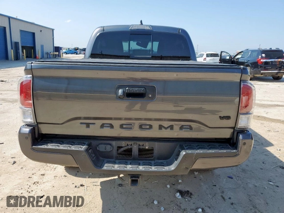 2021 Toyota Tacoma SR with VIN 3TMCZ5AN9MM451389, listed as a Copart auction lot 59191355 with 26,427 mi miles and Salvage title. Bid and sale history available at DreamBid. Image 6.