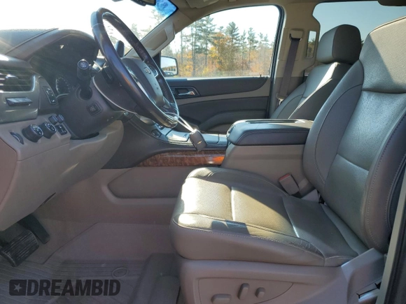 2019 Chevrolet Suburban Premier with VIN 1GNSKJKC6KR293389, listed as a Copart auction lot 77700264 with 49,057 mi miles and Salvage Title. Bid and sale history available at DreamBid. Image 7.