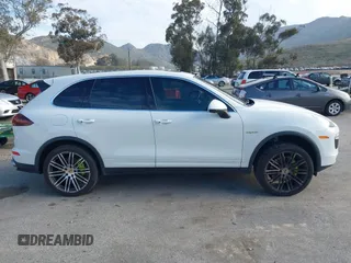 2016 Porsche Cayenne S E-Hybrid with VIN WP1AE2A25GLA58503, listed as a IAAI auction lot 41815568 with 140,635 mi miles and . Bid and sale history available at DreamBid. Image 13.