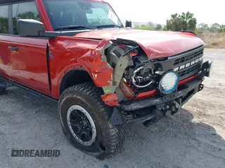 2023 Ford Bronco with VIN 1FMEE5DP7PLC06447, listed as a IAAI auction lot 41881411 with 6,842 mi miles. Bid and sale history available at carsss.com. Image 6.