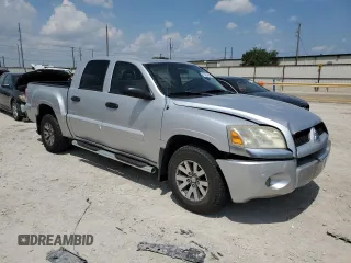 2007 Mitsubishi Raider LS z VIN 1Z7HC28KX7S126249, wystawiony jako Copart lot #63955484 z przebiegiem 176 786 mil mil oraz Szkoda całkowita • Salvage title. Historia ofert i sprzedaży dostępna na DreamBid. Obrazek 4.