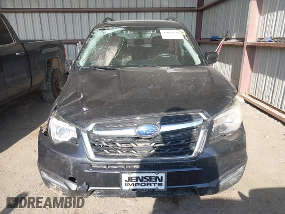 2017 Subaru Forester Touring with VIN JF2SJAWC6HH466379, listed as a IAAI auction lot 42031728 with 140,020 mi miles and . Bid and sale history available at DreamBid. Image 12.