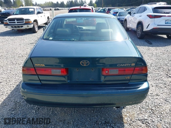 1998 Toyota Camry LE z VIN JT2BF28K4W0101312, wystawiony jako IAAI lot #42116546 z przebiegiem 365 712 mil mil oraz . Historia ofert i sprzedaży dostępna na DreamBid. Obrazek 16.
