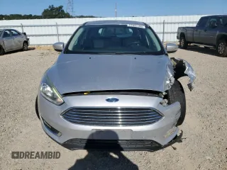 2017 Ford Focus Titanium with VIN 1FADP3N21HL279810, listed as a Copart auction lot 57950195 with 121,139 mi miles and Salvage title. Bid and sale history available at DreamBid. Image 5.
