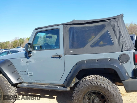 2015 Jeep Wrangler Sport with VIN 1C4AJWAG0FL591213, listed as a IAAI auction lot 41893306 with 107,807 mi miles and . Bid and sale history available at DreamBid. Image 14.
