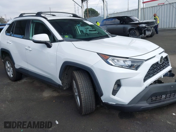 2019 Toyota RAV4 XLE with VIN 2T3W1RFV5KW051023, listed as a IAAI auction lot 40970612 with 106,359 mi miles and . Bid and sale history available at DreamBid. Image 1.