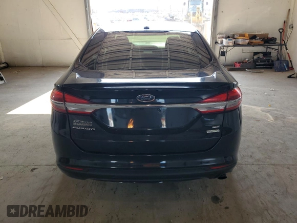 2018 Ford Fusion SE z VIN 3FA6P0HDXJR130677, wystawiony jako Copart lot #51737345 z przebiegiem 129 918 mil mil oraz Szkoda całkowita • Salvage title. Historia ofert i sprzedaży dostępna na DreamBid. Obrazek 6.