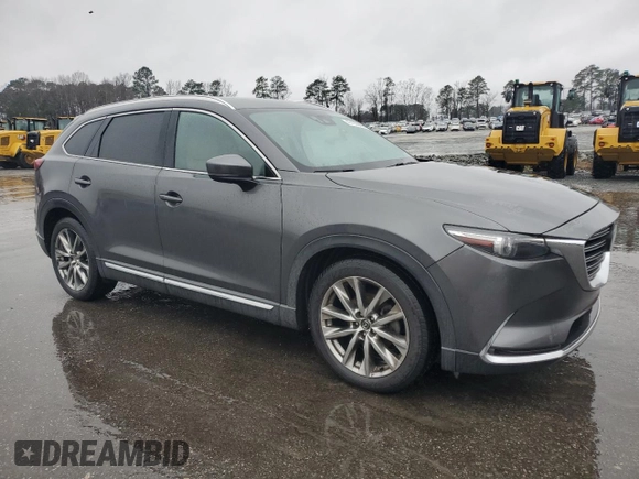 2017 Mazda CX-9 Grand Touring with VIN JM3TCADY9H0135314, listed as a Copart auction lot 45103505 with 133,185 mi miles and Salvage title. Bid and sale history available at DreamBid. Image 4.