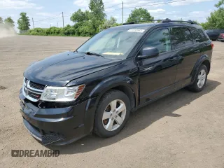 2013 Dodge Journey SE with VIN 3C4PDCAB0DT500365, listed as a Copart auction lot 61033665 with 193,231 mi miles and Salvage title. Bid and sale history available at DreamBid. Image 1.