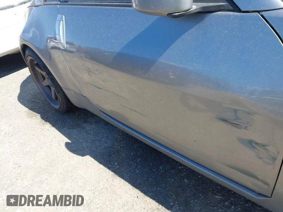 2003 Nissan 350Z Touring z VIN JN1AZ34E03T004458, wystawiony jako IAAI lot #42361684 z przebiegiem 147 847 mil mil oraz . Historia ofert i sprzedaży dostępna na DreamBid. Obrazek 12.