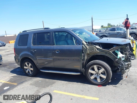 2013 Honda Pilot Touring with VIN 5FNYF3H94DB024069, listed as a IAAI auction lot 42638568 with 190,326 mi miles and . Bid and sale history available at DreamBid. Image 13.