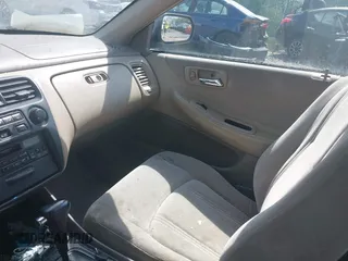 1999 Honda Accord LX z VIN 1HGCG6651XA016177, wystawiony jako IAAI lot #42179777 z przebiegiem Nie podano mil oraz . Historia ofert i sprzedaży dostępna na DreamBid. Obrazek 5.