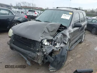 2005 Ford Escape XLT with VIN 1FMYU03155KB15647, listed as a IAAI auction lot 41865555 with 1 mi miles. Bid and sale history available at carsss.com. Image 2.