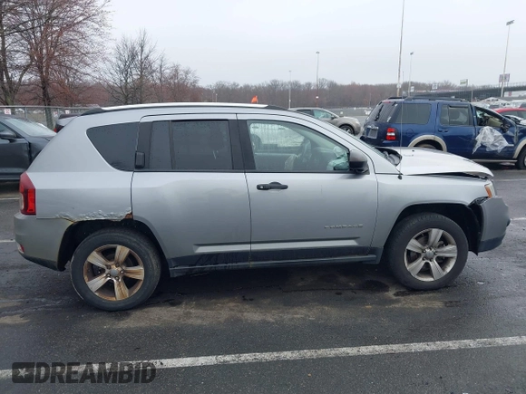 2014 Jeep Compass Sport with VIN 1C4NJDBB8ED734667, listed as a IAAI auction lot 41836914 with 221,028 mi miles. Bid and sale history available at carsss.com. Image 13.
