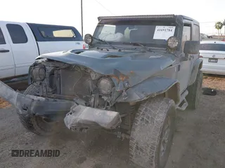 2014 Jeep Wrangler Sport with VIN 1C4AJWAG0EL326774, listed as a IAAI auction lot 41691784 with 98,696 mi miles and . Bid and sale history available at DreamBid. Image 18.
