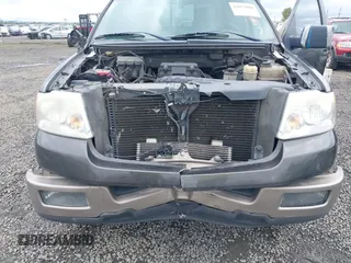 2005 Ford F-150 XLT with VIN 1FTPW12555KE71004, listed as a IAAI auction lot 42023000 with 185,051 mi miles. Bid and sale history available at carsss.com. Image 6.