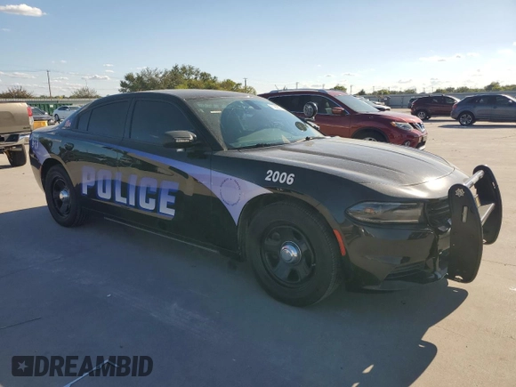 2019 Dodge Charger Police with VIN 2C3CDXAGXKH753432, listed as a Copart auction lot 71969554 with 77,385 mi miles and Clean Title. Bid and sale history available at DreamBid. Image 4.