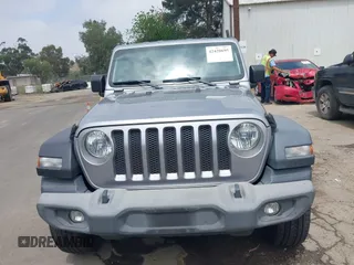 2018 Jeep Wrangler Unlimited Sport S with VIN 1C4HJXDN5JW145340, listed as a IAAI auction lot 42420695 with 92,500 mi miles and . Bid and sale history available at DreamBid. Image 12.