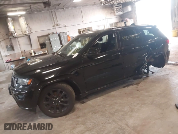 2018 Jeep Grand Cherokee Laredo E with VIN 1C4RJFAG4JC298393, listed as a IAAI auction lot 42073426 with 145,386 mi miles. Bid and sale history available at carsss.com. Image 16.