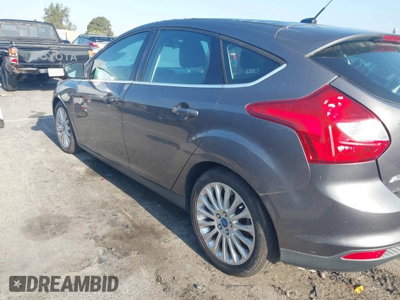 2012 Ford Focus Titanium with VIN 1FAHP3N22CL200249, listed as a IAAI auction lot 42149873 with 103,805 mi miles and . Bid and sale history available at carsss.com. Image 6.