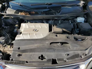2013 Lexus RX 350 z VIN 2T2ZK1BA6DC094275, wystawiony jako Copart lot #61930695 z przebiegiem 296 070 mil mil oraz Szkoda całkowita • Salvage title. Historia ofert i sprzedaży dostępna na DreamBid. Obrazek 11.
