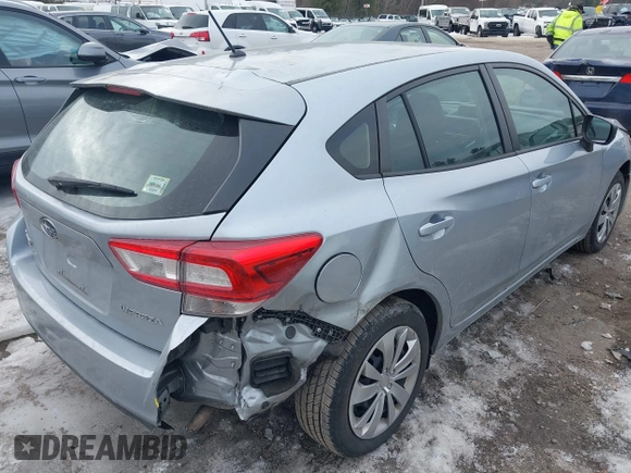2018 Subaru Impreza with VIN 4S3GTAA65J1740704, listed as a IAAI auction lot 41723889 with 53,679 mi miles. Bid and sale history available at carsss.com. Image 4.