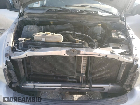 2003 Dodge 1500 with VIN 1D3HU18Z53J508034, listed as a Copart auction lot 84736694 with 198,526 mi miles and Salvage Title. Bid and sale history available at DreamBid. Image 11.