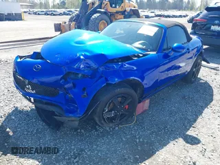 2006 Mazda MX-5 Miata Touring z VIN JM1NC25F560104482, wystawiony jako IAAI lot #42045035 z przebiegiem 131 892 mil mil oraz . Historia ofert i sprzedaży dostępna na DreamBid. Obrazek 18.