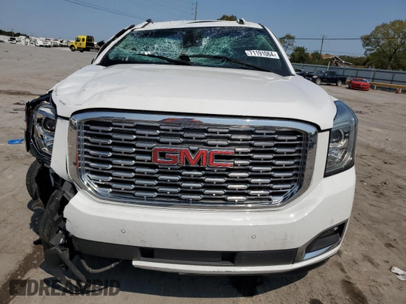2019 GMC Yukon Denali with VIN 1GKS1CKJ7KR194428, listed as a Copart auction lot 71191064 with 56,409 mi miles and Salvage Title. Bid and sale history available at carsss.com. Image 5.