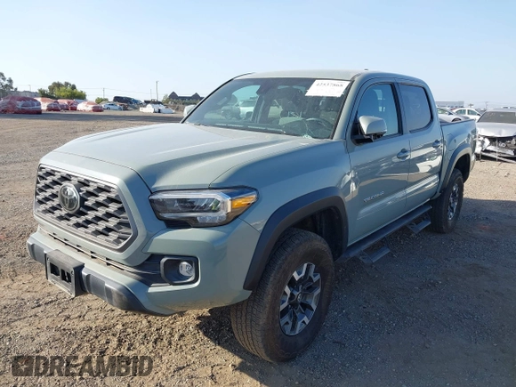 2022 Toyota Tacoma SR with VIN 3TMCZ5AN7NM501028, listed as a IAAI auction lot 42537868 with 42,186 mi miles and . Bid and sale history available at DreamBid. Image 6.
