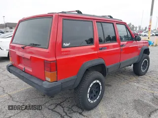 1996 Jeep Cherokee Country with VIN 1J4FJ78S3TL116814, listed as a IAAI auction lot 42131760 with 209,510 mi miles and . Bid and sale history available at DreamBid. Image 4.