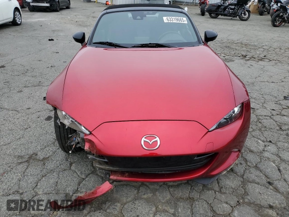 2021 Mazda MX-5 Miata Sport с VIN JM1NDAB78M0454772, выставлен на аукционе Copart как лот 63319665 с пробегом 58 373 миль миль и Списание • Salvage title. История ставок и продаж доступна на DreamBid. Изображение 5.