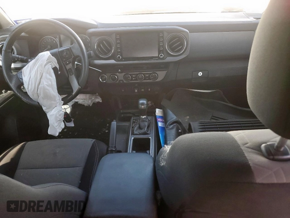 2021 Toyota Tacoma SR с VIN 5TFCZ5AN7MX268938, выставлен на аукционе Copart как лот 61241295 с пробегом 61 747 миль миль и Списание • Salvage title. История ставок и продаж доступна на DreamBid. Изображение 8.