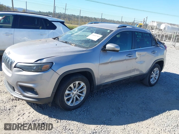 2019 Jeep Cherokee Latitude with VIN 1C4PJLCB4KD428000, listed as a IAAI auction lot 40602703 with 232,159 mi miles and . Bid and sale history available at DreamBid. Image 2.