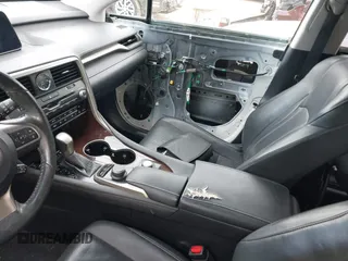 2016 Lexus RX 350 F Sport with VIN 2T2BZMCA3GC010155, listed as a IAAI auction lot 41991594 with 168,478 mi miles. Bid and sale history available at carsss.com. Image 5.