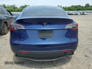 2024 Tesla Model Y Long Range z VIN 7SAYGDEE8RA248635, wystawiony jako Copart lot #59130125 z przebiegiem 21 210 mil mil oraz Szkoda całkowita • Salvage title. Historia ofert i sprzedaży dostępna na DreamBid. Obrazek 6.