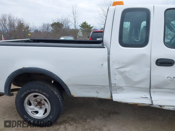 2003 Ford F-150 XL with VIN 2FTRX18W03CB12800, listed as a IAAI auction lot 41897027 with 1 mi miles. Bid and sale history available at carsss.com. Image 12.