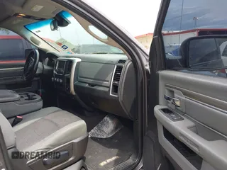 2015 Ram 1500 SLT z VIN 1C6RR6GT7FS742111, wystawiony jako IAAI lot #42469927 z przebiegiem 111 130 mil mil oraz . Historia ofert i sprzedaży dostępna na DreamBid. Obrazek 5.