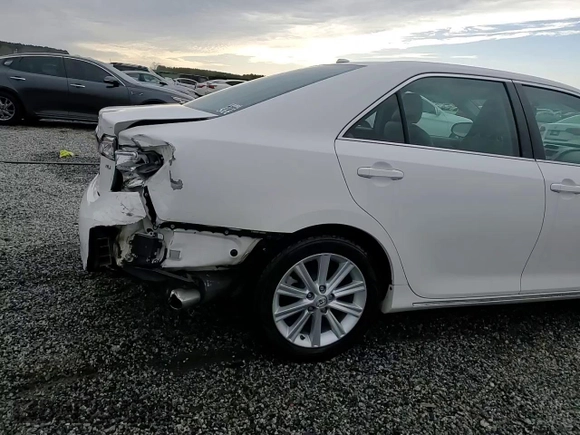 2014 Toyota Camry SE with VIN 4T1BK1FK2EU542746, listed as a Copart auction lot 48057825 with 112,547 mi miles and Salvage Title. Bid and sale history available at carsss.com. Image 13.